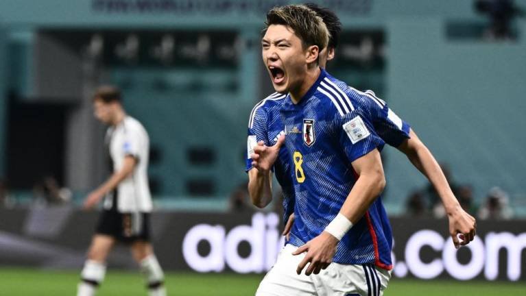 El mediocampista japonés #08 Ritsu Doan celebra el gol ante Alemania. AFP